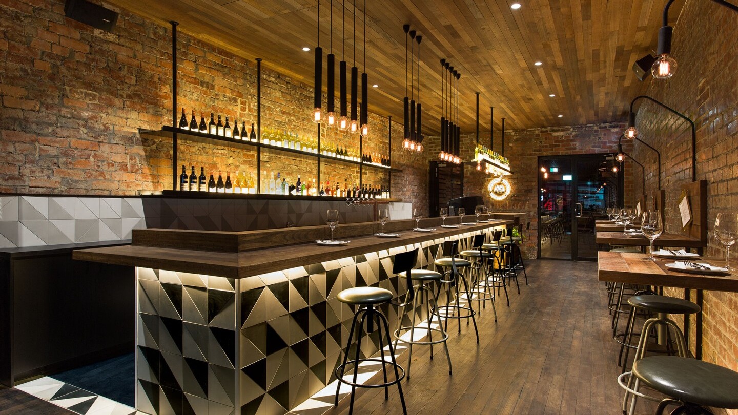 Stylish modern bar interior with warm ambient lighting